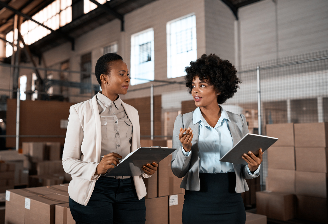 A warehouse operative receiving practical training on supply chain operations and logistics processes. 